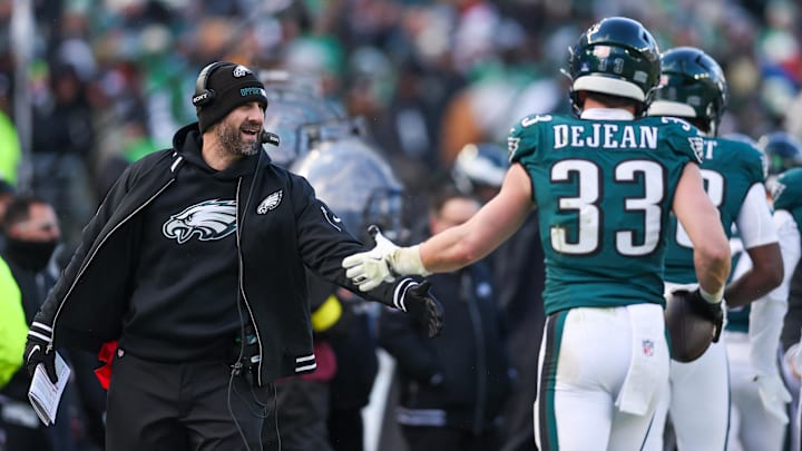 Dec 14, 2025; Philadelphia, Pennsylvania, USA; Philadelphia Eagles cornerback Cooper Dejean (33) and head coach Nick Sirianni celebrate on the sideline after an interception during the third quarter against the Las Vegas Raiders at Lincoln Financial Field. Mandatory Credit: Bill Streicher-Imagn Images