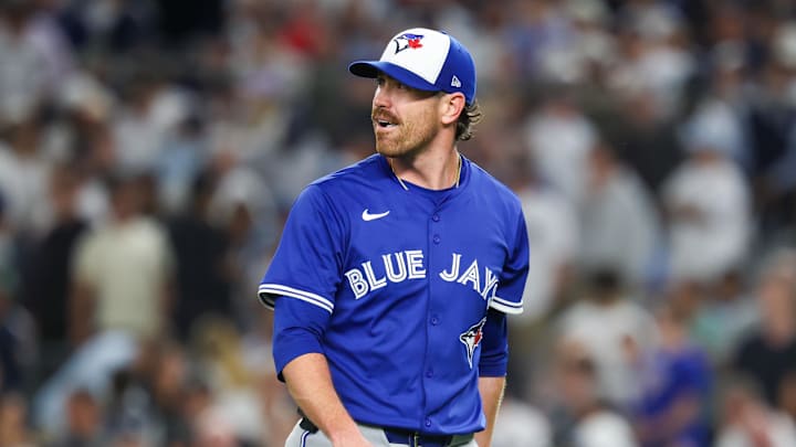 Oct 7, 2025; Bronx, New York, USA; Toronto Blue Jays starting pitcher Shane Bieber (57) walks to the dugout after being relieved of his pitching duties in the third inning against the New York Yankees during game three of the ALDS round for the 2025 MLB playoffs at Yankee Stadium. 
