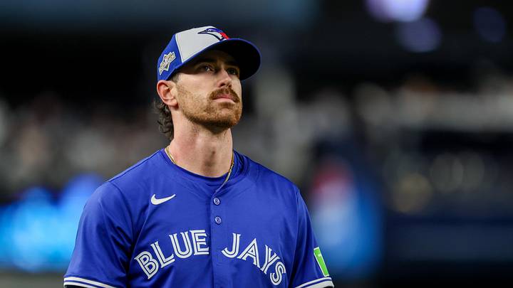 Toronto Blue Jays starting pitcher Shane Bieber walks to the dugout.
