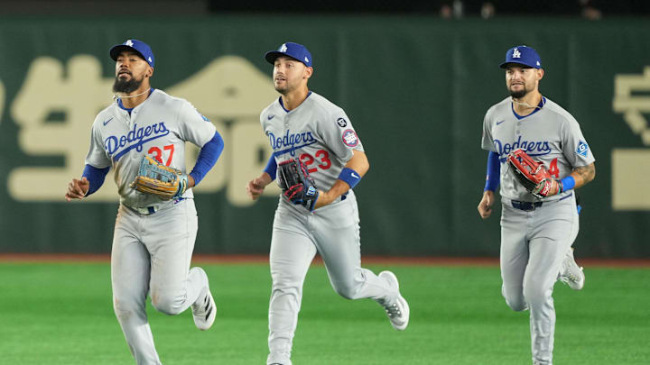 Mar 18, 2025; Bunkyo, Tokyo, JPN; Los Angeles Dodgers oiutfielders Teoscar Hernández (37), Michael Conforto (23), and Andy Pages (44) celebrate after defeating the Chicago Cubs during the Tokyo Series at Tokyo Dome. Mandatory Credit: Darren Yamashita-Imagn Images Mar 18, 2025; Bunkyo, Tokyo, JPN; Los Angeles Dodgers oiutfielders Teoscar Hernández (37), Michael Conforto (23), and Andy Pages (44) celebrate after defeating the Chicago Cubs during the Tokyo Series at Tokyo Dome. Mandatory Credit: Darren Yamashita-Imagn Images