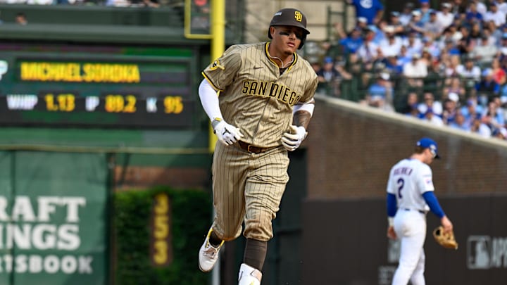 Oct 1, 2025; Chicago, Illinois, USA; San Diego infielder Manny Machado (13) rounds the bases after hitting a two-run home run in the fifth inning against the Chicago Cubs during game two of the Wildcard round for the 2025 MLB playoffs at Wrigley Field. Mandatory Credit: Matt Marton-Imagn Images Oct 1, 2025; Chicago, Illinois, USA; San Diego infielder Manny Machado (13) rounds the bases after hitting a two-run home run in the fifth inning against the Chicago Cubs during game two of the Wildcard round for the 2025 MLB playoffs at Wrigley Field. Mandatory Credit: Matt Marton-Imagn Images