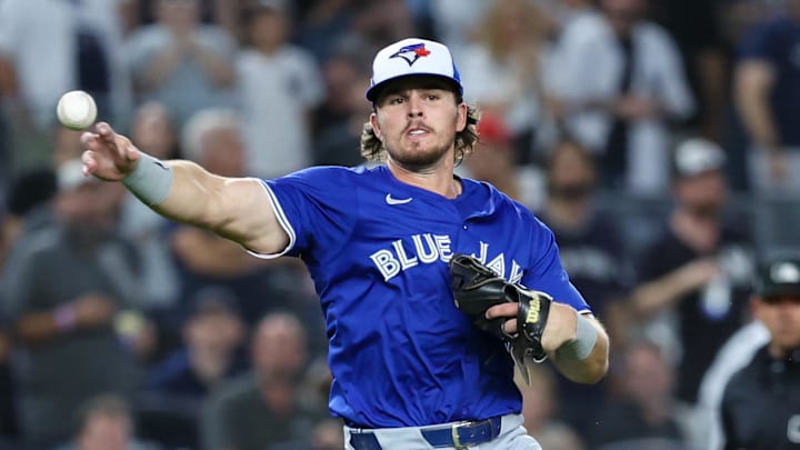Oct 7, 2025; Bronx, New York, USA; Toronto Blue Jays third baseman Addison Barger (47) throws out a runner at third base in the eighth inning against the New York Yankees during game three of the ALDS round for the 2025 MLB playoffs at Yankee Stadium. Mandatory Credit: Wendell Cruz-Imagn Images Oct 7, 2025; Bronx, New York, USA; Toronto Blue Jays third baseman Addison Barger (47) throws out a runner at third base in the eighth inning against the New York Yankees during game three of the ALDS round for the 2025 MLB playoffs at Yankee Stadium. Mandatory Credit: Wendell Cruz-Imagn Images