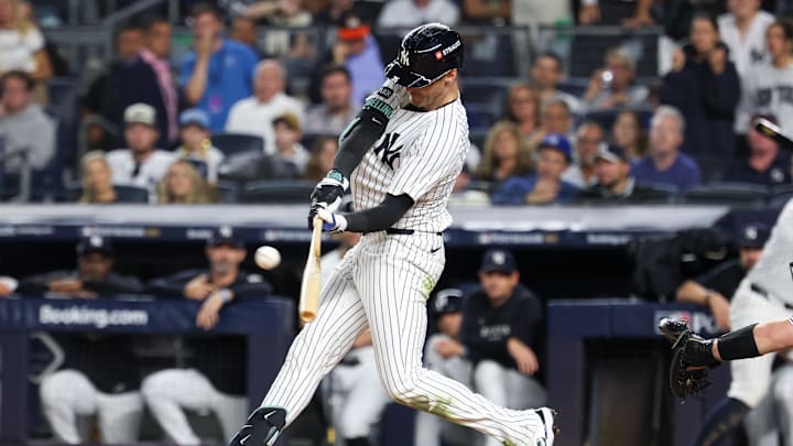 Oct 7, 2025; Bronx, New York, USA; New York Yankees outfielder Cody Bellinger (35) hits a double in the sixth inning against the Toronto Blue Jays during game three of the ALDS round for the 2025 MLB playoffs at Yankee Stadium. Mandatory Credit: Vincent Carchietta-Imagn Images Oct 7, 2025; Bronx, New York, USA; New York Yankees outfielder Cody Bellinger (35) hits a double in the sixth inning against the Toronto Blue Jays during game three of the ALDS round for the 2025 MLB playoffs at Yankee Stadium. Mandatory Credit: Vincent Carchietta-Imagn Images