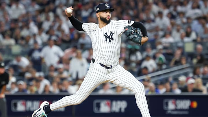 Oct 7, 2025; Bronx, New York, USA; New York Yankees relief pitcher Devin Williams (38) delivers a pitch in the seventh inning against the Toronto Blue Jays during game three of the ALDS round for the 2025 MLB playoffs at Yankee Stadium. Mandatory Credit: Vincent Carchietta-Imagn Images Oct 7, 2025; Bronx, New York, USA; New York Yankees relief pitcher Devin Williams (38) delivers a pitch in the seventh inning against the Toronto Blue Jays during game three of the ALDS round for the 2025 MLB playoffs at Yankee Stadium. Mandatory Credit: Vincent Carchietta-Imagn Images