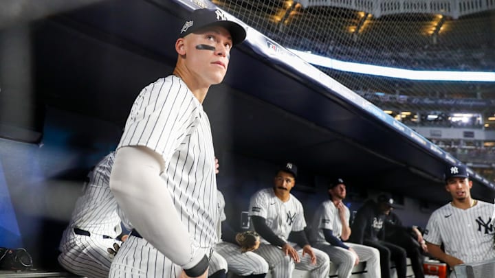Oct 7, 2025; Bronx, New York, USA; New York Yankees outfielder Aaron Judge (99) looks on in the dugout prior to the game against the Toronto Blue Jays during game three of the ALDS round for the 2025 MLB playoffs at Yankee Stadium. Mandatory Credit: Wendell Cruz-Imagn Images