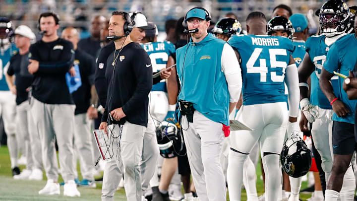 Aug 9, 2025; Jacksonville, Florida, USA; Jacksonville Jaguars defensive coordinator Anthony Campanile stands with head coach Liam Coen on the sidelines during a preseason game against the Pittsburgh Steelers at EverBank Stadium. Mandatory Credit: Travis Register-Imagn Images