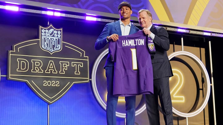 Apr 28, 2022; Las Vegas, NV, USA; Notre Dame safety Kyle Hamilton with NFL commissioner Roger Goodell after being selected as the fourteenth overall pick to the Baltimore Ravens during the first round of the 2022 NFL Draft at the NFL Draft Theater. Mandatory Credit: Kirby Lee-Imagn Images