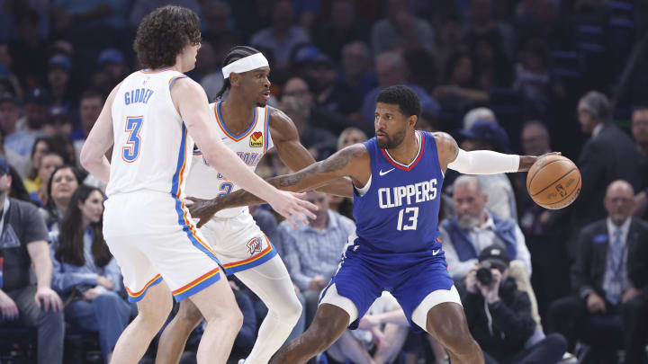 Feb 22, 2024; Oklahoma City, Oklahoma, USA; LA Clippers forward Paul George (13) moves the ball