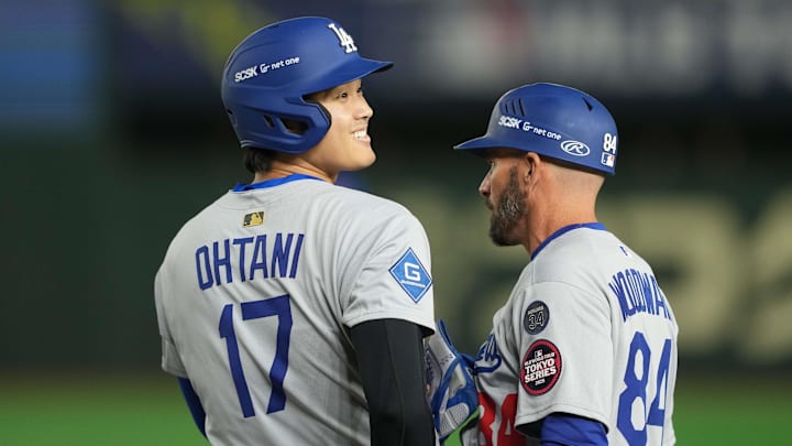 Mar 18, 2025; Bunkyo, Tokyo, JPN; Los Angeles Dodgers designated hitter Shohei Ohtani (17) reacts after hitting a single in the fifth inning against the Chicago Cubs during the Tokyo Series at Tokyo Dome. Mandatory Credit: Darren Yamashita-Imagn Images