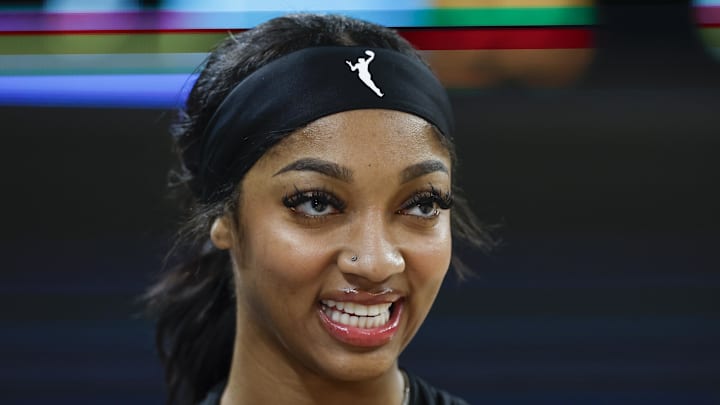 Jun 12, 2024; Chicago, Illinois, USA; Chicago Sky forward Angel Reese (5) smiles before a basketball game against the Connecticut Sun at Wintrust Arena. Mandatory Credit: Kamil Krzaczynski-Imagn Images Jun 12, 2024; Chicago, Illinois, USA; Chicago Sky forward Angel Reese (5) smiles before a basketball game against the Connecticut Sun at Wintrust Arena. Mandatory Credit: Kamil Krzaczynski-Imagn Images