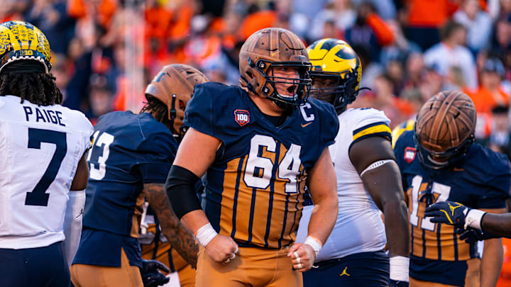 Illinois center Josh Kreutz (64) reacts after a play in the Illini's 21-7 win over No. 24 Michigan on Oct. 19, 2024 at Memorial Stadium in Champaign, Illinois. Illinois center Josh Kreutz (64) reacts after a play in the Illini's 21-7 win over No. 24 Michigan on Oct. 19, 2024 at Memorial Stadium in Champaign, Illinois.