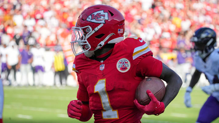 Sep 28, 2025; Kansas City, Missouri, USA; Kansas City Chiefs wide receiver Xavier Worthy (1) runs the ball against the Baltimore Ravens during the game at GEHA Field at Arrowhead Stadium. Mandatory Credit: Denny Medley-Imagn Images