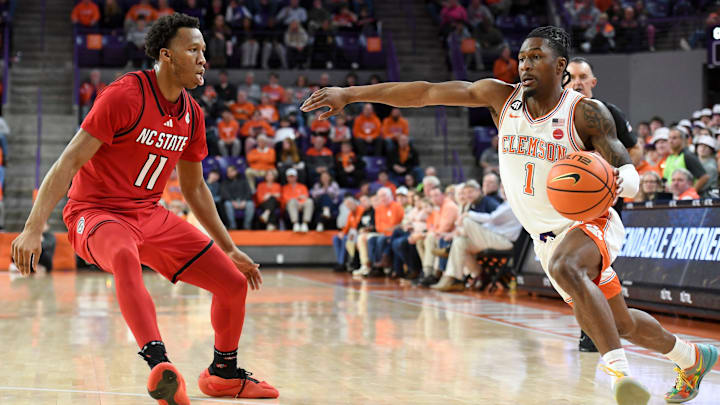 Clemson guard Jestin Porter attempts a dribble past NC State's Quadir Copeland at Littlejohn Coliseum on Tuesday. 