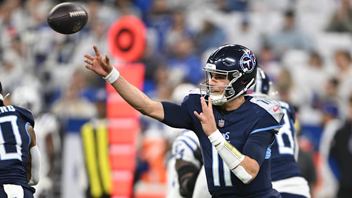 Dec 22, 2024; Indianapolis, Indiana, USA; Tennessee Titans quarterback Mason Rudolph (11) throws a pass during the first quarter against the Indianapolis Colts at Lucas Oil Stadium. Mandatory Credit: Marc Lebryk-Imagn Images