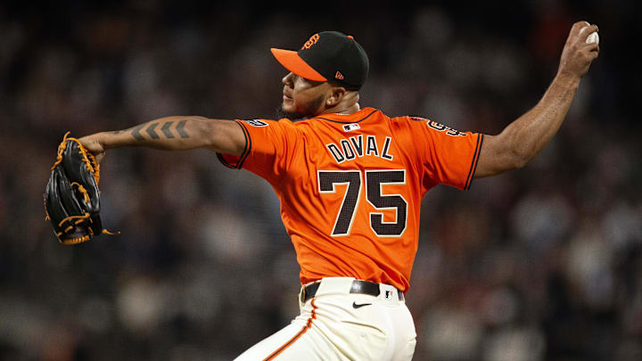 Sep 27, 2024; San Francisco, California, USA; San Francisco Giants pitcher Camilo Doval (75) delivers a pitch against the St. Louis Cardinals during the seventh inning at Oracle Park. Mandatory Credit: D. Ross Cameron-Imagn Images