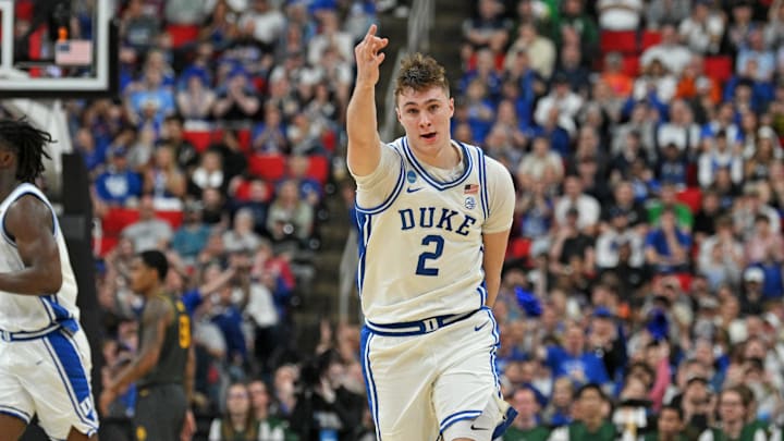 Mar 23, 2025; Raleigh, NC, USA; Duke Blue Devils forward Cooper Flagg (2) reacts after scoring a 3 pointer during the first half against the Baylor Bears in the second round of the NCAA Tournament at Lenovo Center. Mandatory Credit: Zachary Taft-Imagn Images
