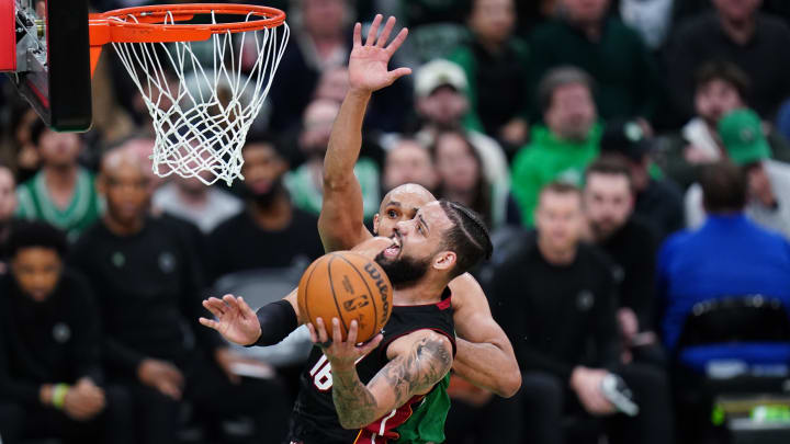 Apr 24, 2024; Boston, Massachusetts, USA; Miami Heat forward Caleb Martin (16) drives to the basket against the Boston Celtics - David Butler II/USA TODAY Sports