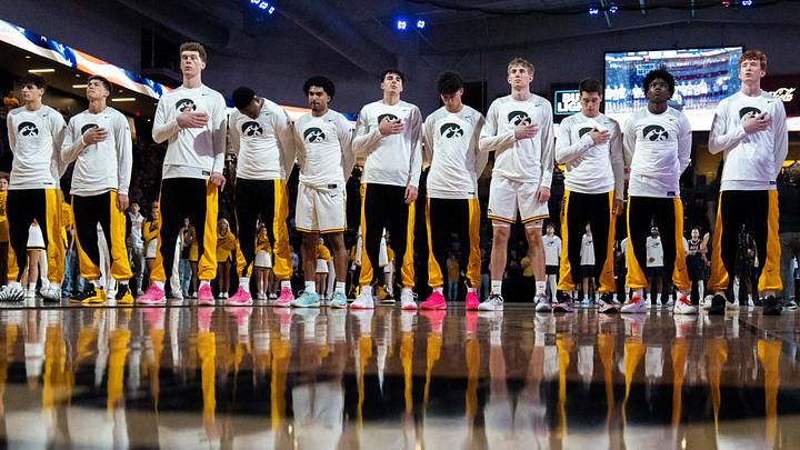 The Iowa Hawkeyes men’s basketball team stands for the national anthem Oct. 27, 2026 before an exhibition game against the Illinois Springfield Prairie Stars at Xtream Arena in Coralville, Iowa. The Iowa Hawkeyes men’s basketball team stands for the national anthem Oct. 27, 2026 before an exhibition game against the Illinois Springfield Prairie Stars at Xtream Arena in Coralville, Iowa.