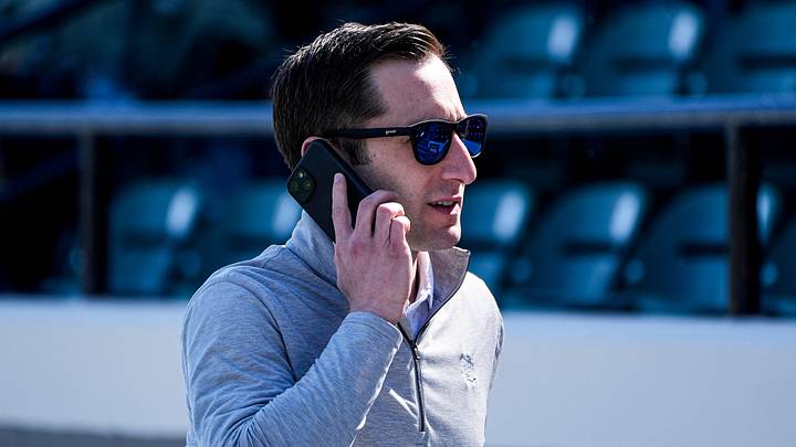 Detroit Tigers general manager Jeff Greenberg on the phone at practice during spring training at TigerTown in Lakeland, Fla. on Friday, Feb. 20, 2026. Detroit Tigers general manager Jeff Greenberg on the phone at practice during spring training at TigerTown in Lakeland, Fla. on Friday, Feb. 20, 2026.