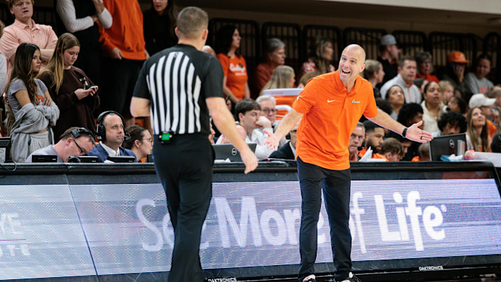 Mar 7, 2026; Stillwater, Oklahoma, USA; Oklahoma State Cowboys coach Steve Lutz speaks to a referee after a play during the first half against the Houston Cougars at Gallagher-Iba Arena. Mandatory Credit: William Purnell-Imagn Images Mar 7, 2026; Stillwater, Oklahoma, USA; Oklahoma State Cowboys coach Steve Lutz speaks to a referee after a play during the first half against the Houston Cougars at Gallagher-Iba Arena. Mandatory Credit: William Purnell-Imagn Images