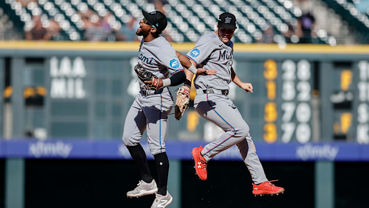 Sep 18, 2025; Denver, Colorado, USA; Miami Marlins shortstop Otto Lopez (6) and center fielder Jakob Marsee (87) celebrate after the game against the Colorado Rockies at Coors Field. Mandatory Credit: Isaiah J. Downing-Imagn Images Sep 18, 2025; Denver, Colorado, USA; Miami Marlins shortstop Otto Lopez (6) and center fielder Jakob Marsee (87) celebrate after the game against the Colorado Rockies at Coors Field. Mandatory Credit: Isaiah J. Downing-Imagn Images