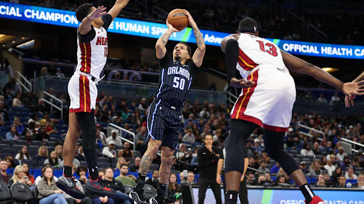 Orlando Magic guard Cole Anthony (50) shoots the ball against the Miami Heat in the third quarter at Kia Center.