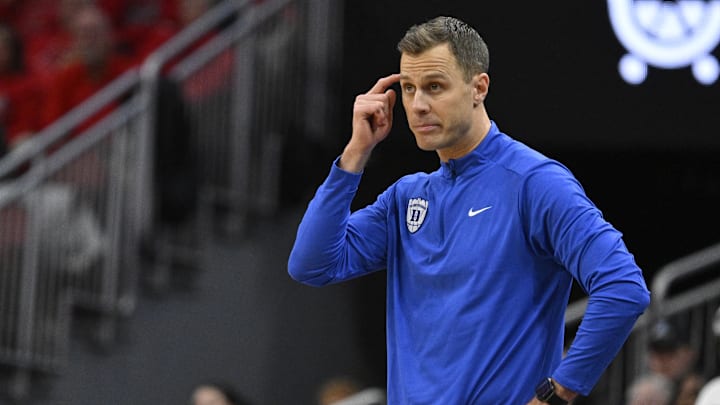 Jan 6, 2026; Louisville, Kentucky, USA;  Duke Blue Devils head coach Jon Scheyer reacts during the second half against the Louisville Cardinals.