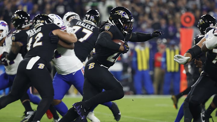 Sep 29, 2024; Baltimore, Maryland, USA; Baltimore Ravens running back Derrick Henry (22) carries the ball en route to a touchdown against the Buffalo Bills during the first quarter at M&T Bank Stadium. Mandatory Credit: Geoff Burke-Imagn Images
