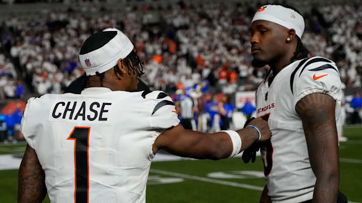 Cincinnati Bengals wide receiver Ja'Marr Chase (1) and wide receiver Tee Higgins (5) talk on the sideline in the fourth quarter of the NFL Week 3 game between the Cincinnati Bengals and the Los Angeles Rams at Paycor Stadium in downtown Cincinnati on Monday, Sept. 25, 2023. The Bengals beat the Rams, 19-16, improving to 1-2.