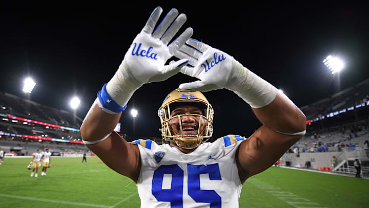 Sep 9, 2023; San Diego, California, USA; UCLA Bruins defensive lineman Sitiveni Havili-Kaufusi (95) waves to the crowd after the game against the San Diego State Aztecs at Snapdragon Stadium. Mandatory Credit: Orlando Ramirez-Imagn Images Sep 9, 2023; San Diego, California, USA; UCLA Bruins defensive lineman Sitiveni Havili-Kaufusi (95) waves to the crowd after the game against the San Diego State Aztecs at Snapdragon Stadium. Mandatory Credit: Orlando Ramirez-Imagn Images