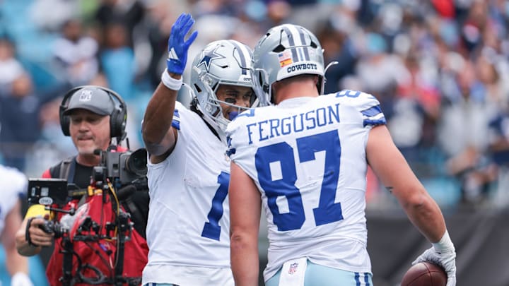 Dallas Cowboys tight end Jake Ferguson celebrates a touchdown with wide receiver Jalen Tolbert Dallas Cowboys tight end Jake Ferguson celebrates a touchdown with wide receiver Jalen Tolbert