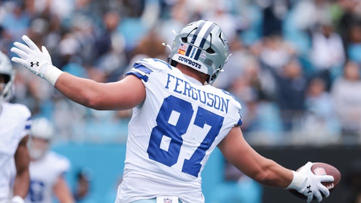 Oct 12, 2025; Charlotte, North Carolina, USA; Dallas Cowboys tight end Jake Ferguson (87) celebrates a touchdown during the second quarter against the Carolina Panthers at Bank of America Stadium. 