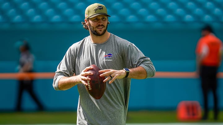 Buffalo Bills quarterback Josh Allen (17) warms up before a game against the Miami Dolphins at Hard Rock Stadium.