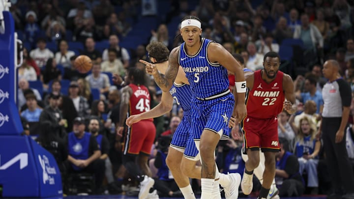 Dec 5, 2025; Orlando, Florida, USA; Orlando Magic forward Paolo Banchero (5) reacts after a basket against the Miami Heat in the first quarter at Kia Center. Mandatory Credit: Nathan Ray Seebeck-Imagn Images Dec 5, 2025; Orlando, Florida, USA; Orlando Magic forward Paolo Banchero (5) reacts after a basket against the Miami Heat in the first quarter at Kia Center. Mandatory Credit: Nathan Ray Seebeck-Imagn Images