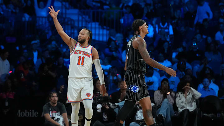 Dec 13, 2025; Las Vegas, Nevada, USA; New York Knicks guard Jalen Brunson (11) reacts as Orlando Magic forward Paolo Banchero (5) walks away during the third quarter at T-Mobile Arena. Mandatory Credit: Kirby Lee-Imagn Images