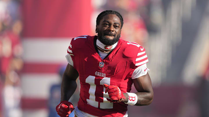 Sep 9, 2024; Santa Clara, California, USA; San Francisco 49ers wide receiver Brandon Aiyuk (11) is introduced to the crowd before the game against the New York Jets at Levi's Stadium. Mandatory Credit: Darren Yamashita-Imagn Images