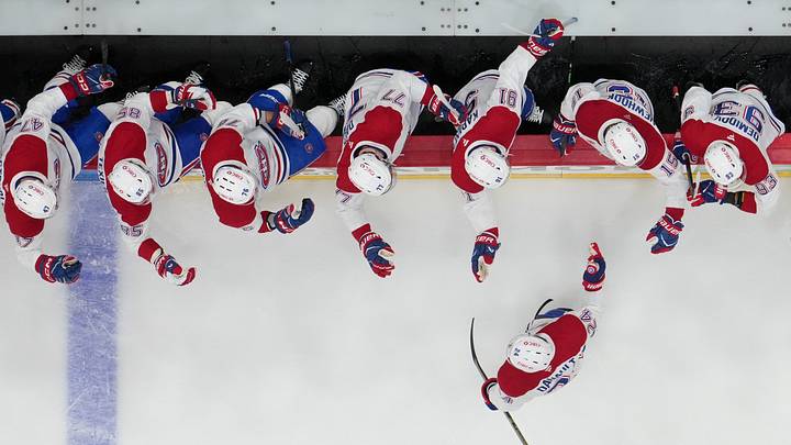 May 21, 2026; Raleigh, North Carolina, USA; Montreal Canadiens center Phillip Danault (24) celebrates with teammates after scoring a goal against the Carolina Hurricanes during the first period in game one of the Eastern Conferene Final of the 2026 Stanley Cup Playoffs at Lenovo Center. Mandatory Credit: James Guillory-Imagn Images