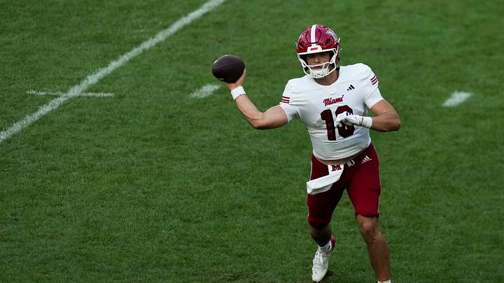 Sep 19, 2026; Cincinnati, Ohio, USA; Miami (OH) RedHawks quarterback David McComb (16) throws a pass against the Cincinnati Bearcats in the second half at TQL Stadium. Mandatory Credit: Aaron Doster-Imagn Images Sep 19, 2026; Cincinnati, Ohio, USA; Miami (OH) RedHawks quarterback David McComb (16) throws a pass against the Cincinnati Bearcats in the second half at TQL Stadium. Mandatory Credit: Aaron Doster-Imagn Images