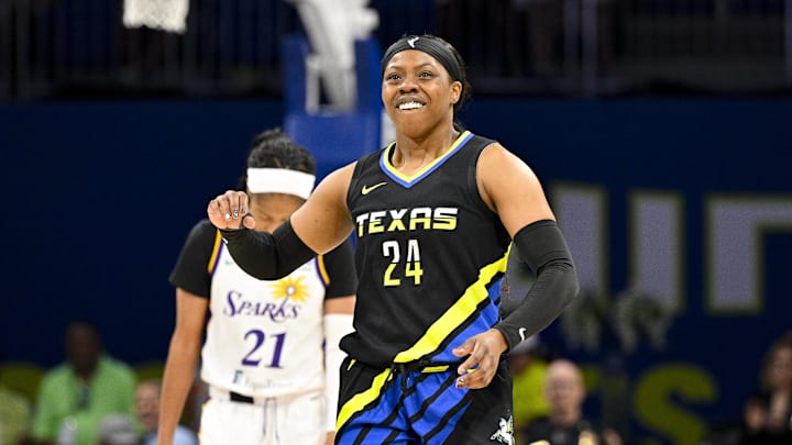 Dallas Wings guard Arike Ogunbowale (24) celebrates.