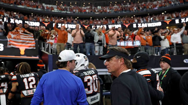 Oklahoma State football head coach Mike Gundy walks of the field following the Big 12 Football Championship game between the Oklahoma State University Cowboys and the Texas Longhorns at the AT&T Stadium in Arlington, Texas, Saturday, Dec. 2, 2023.
