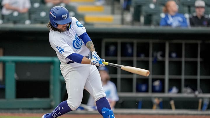 Oklahoma City infielder Michael Chavis (22) hits a foul ball off his foot during the home opener Minor League baseball game between the Oklahoma City Comets and the El Paso Chihuahuas at Chickasaw Bricktown Ballpark in Oklahoma City on April 1, 2025.