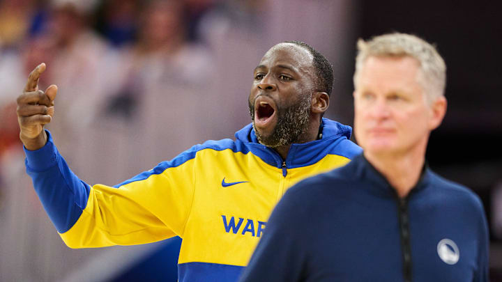Dec 28, 2024; San Francisco, California, USA; Golden State Warriors forward Draymond Green (23) and head coach Steve Kerr react to game play against the Phoenix Suns during the third quarter at Chase Center. Mandatory Credit: Robert Edwards-Imagn Images