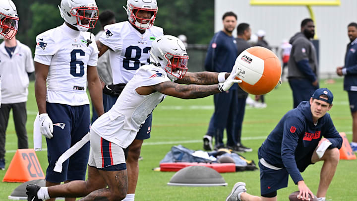 Jun 9, 2025; Foxborough, MA, USA; New England Patriots wide receiver Ja'Lynn Polk (1) works with a training aid during minicamp at Gillette Stadium. Mandatory Credit: Eric Canha-Imagn Images