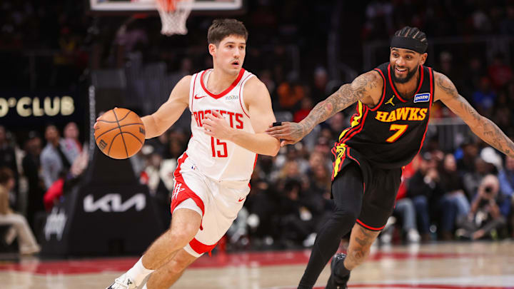 Jan 29, 2026; Atlanta, Georgia, USA; Houston Rockets guard Reed Sheppard (15) drives on Atlanta Hawks guard Nickeil Alexander-Walker (7) in the fourth quarter at State Farm Arena. Mandatory Credit: Brett Davis-Imagn Images Jan 29, 2026; Atlanta, Georgia, USA; Houston Rockets guard Reed Sheppard (15) drives on Atlanta Hawks guard Nickeil Alexander-Walker (7) in the fourth quarter at State Farm Arena. Mandatory Credit: Brett Davis-Imagn Images