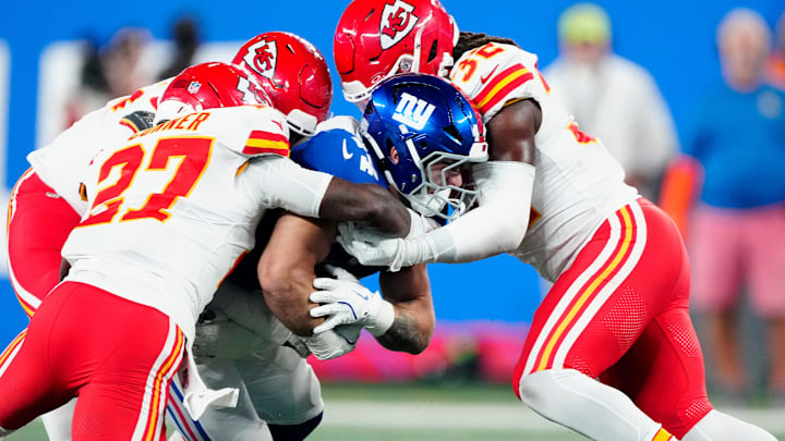A trio of Kansas City Chiefs tries to take down, New York Giants running back Cam Skattebo (44), Sunday, September 21, 2025. A trio of Kansas City Chiefs tries to take down, New York Giants running back Cam Skattebo (44), Sunday, September 21, 2025.