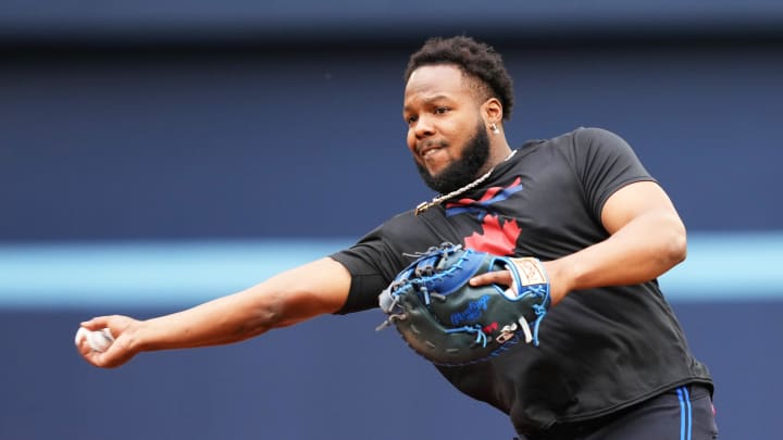 Toronto Blue Jays first base Vladimir Guerrero Jr. (27) throws a ball to first base during batting practice before a game against the New York Yankees at Rogers Centre on June 28.