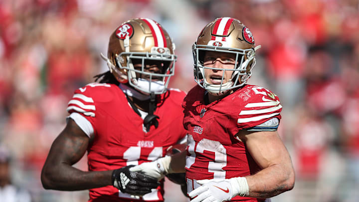 San Francisco 49ers wide receiver Brandon Aiyuk (L) and running back Christian McCaffrey (R)