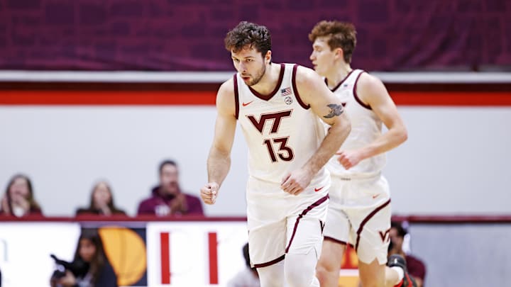 Jan 25, 2025; Blacksburg, Virginia, USA; Virginia Tech Hokies forward Ben Burnham (13) reacts after making a three pointer during the second half against the Clemson Tigers at Cassell Coliseum. Mandatory Credit: Peter Casey-Imagn Images Jan 25, 2025; Blacksburg, Virginia, USA; Virginia Tech Hokies forward Ben Burnham (13) reacts after making a three pointer during the second half against the Clemson Tigers at Cassell Coliseum. Mandatory Credit: Peter Casey-Imagn Images