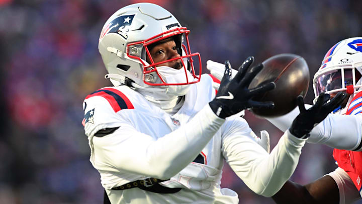 Dec 22, 2024; Orchard Park, New York, USA; New England Patriots wide receiver Kayshon Boutte (9) catches a pass for a touchdown against the Buffalo Bills in the first quarter at Highmark Stadium. Mandatory Credit: Mark Konezny-Imagn Images