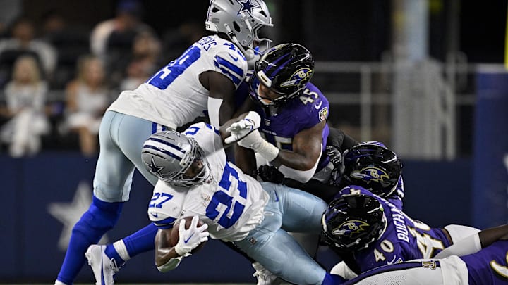 Aug 16, 2025; Arlington, Texas, USA; Baltimore Ravens linebacker Teddye Buchanan (40) and linebacker Mike Green (45) tackles Dallas Cowboys running back Miles Sanders (27) during the game between the Dallas Cowboys and the Baltimore Ravens at AT&T Stadium. Mandatory Credit: Jerome Miron-Imagn Images Aug 16, 2025; Arlington, Texas, USA; Baltimore Ravens linebacker Teddye Buchanan (40) and linebacker Mike Green (45) tackles Dallas Cowboys running back Miles Sanders (27) during the game between the Dallas Cowboys and the Baltimore Ravens at AT&T Stadium. Mandatory Credit: Jerome Miron-Imagn Images